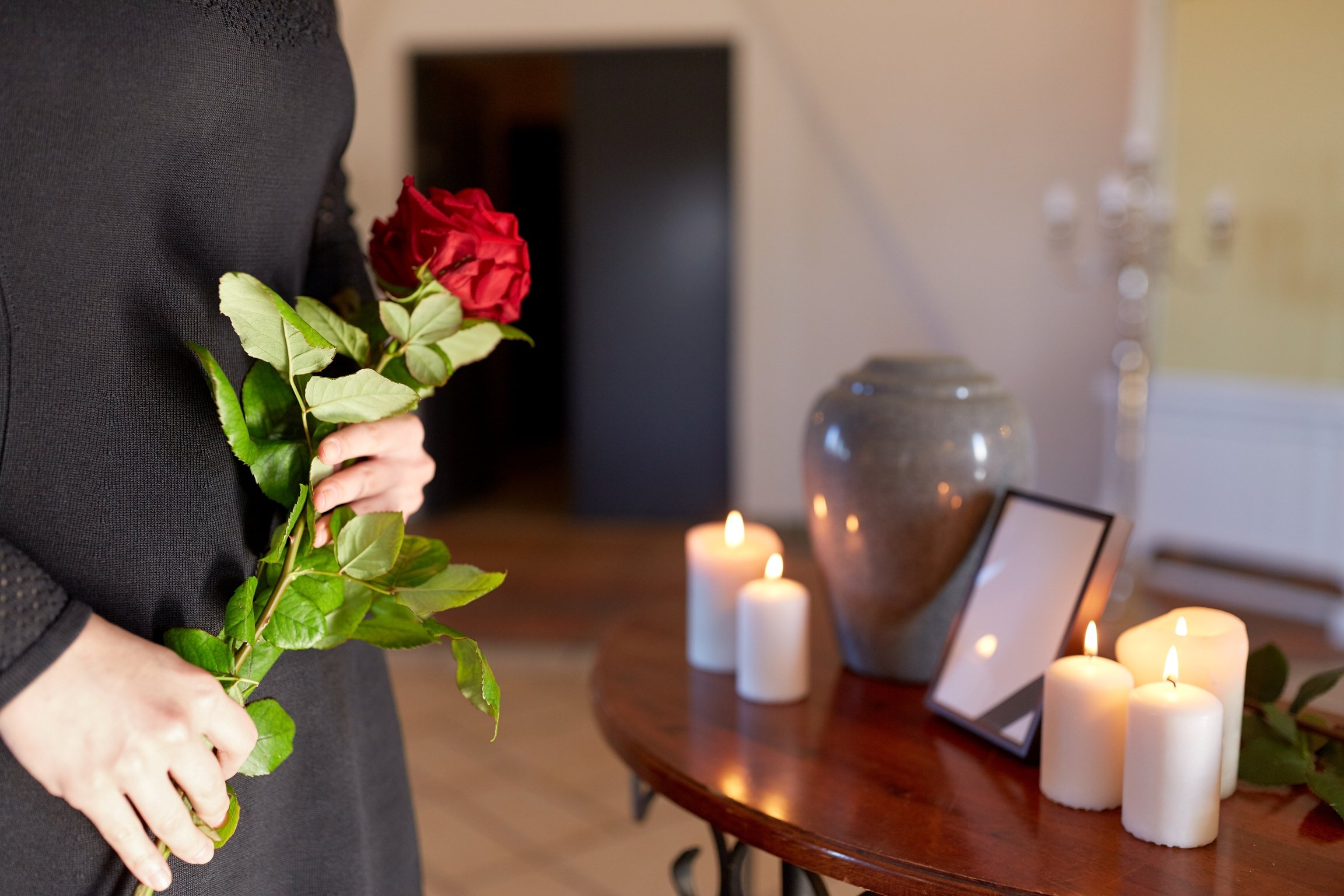 Woman with Cremation Urn